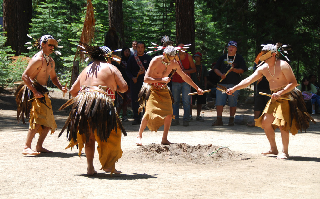community-1 Five Native American men in traditional dance