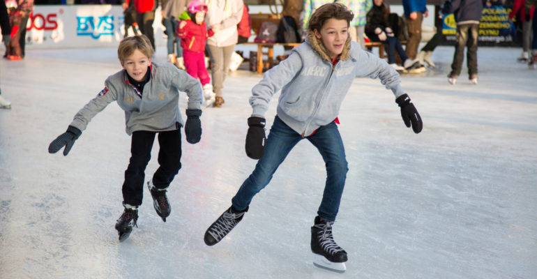 2 boys Ice skating