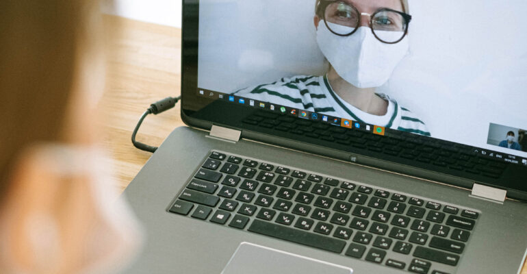 Woman having video call